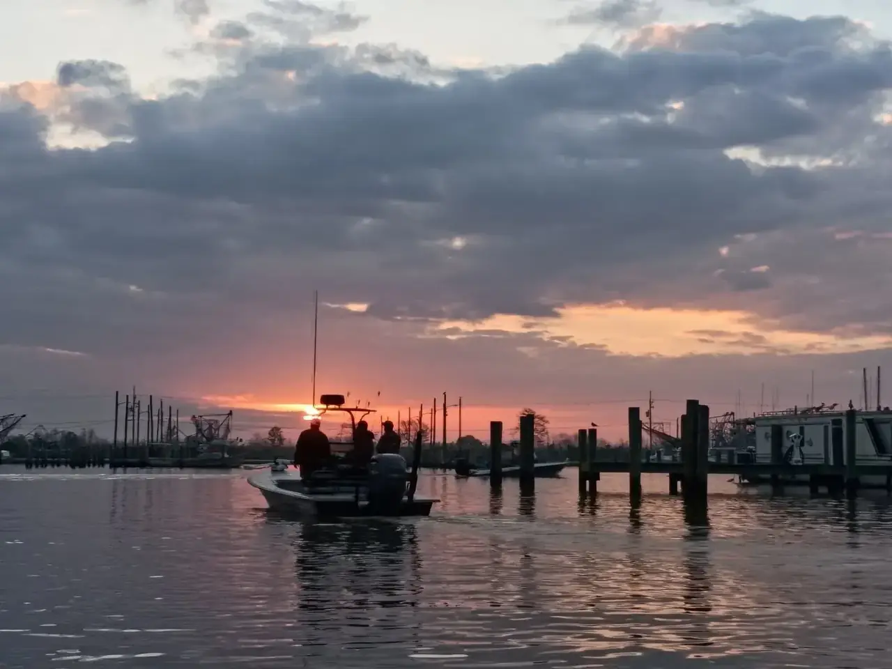 Sunrise over the boat slips at the marina in Venice, Louisiana
